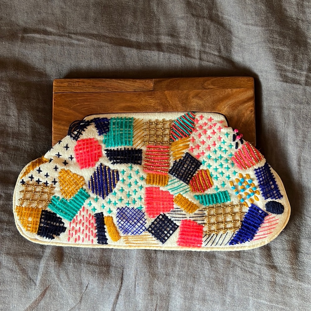 Lovestitch embroidered clutch with wooden handle